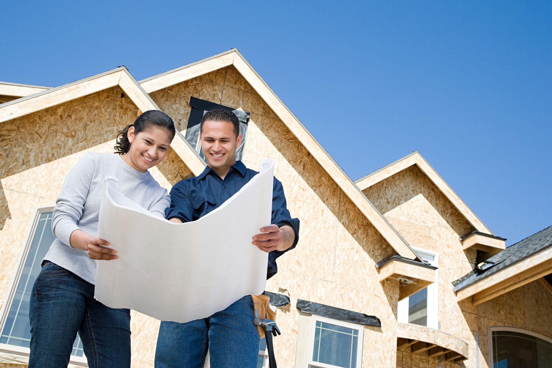 Couple looking at a blueprint