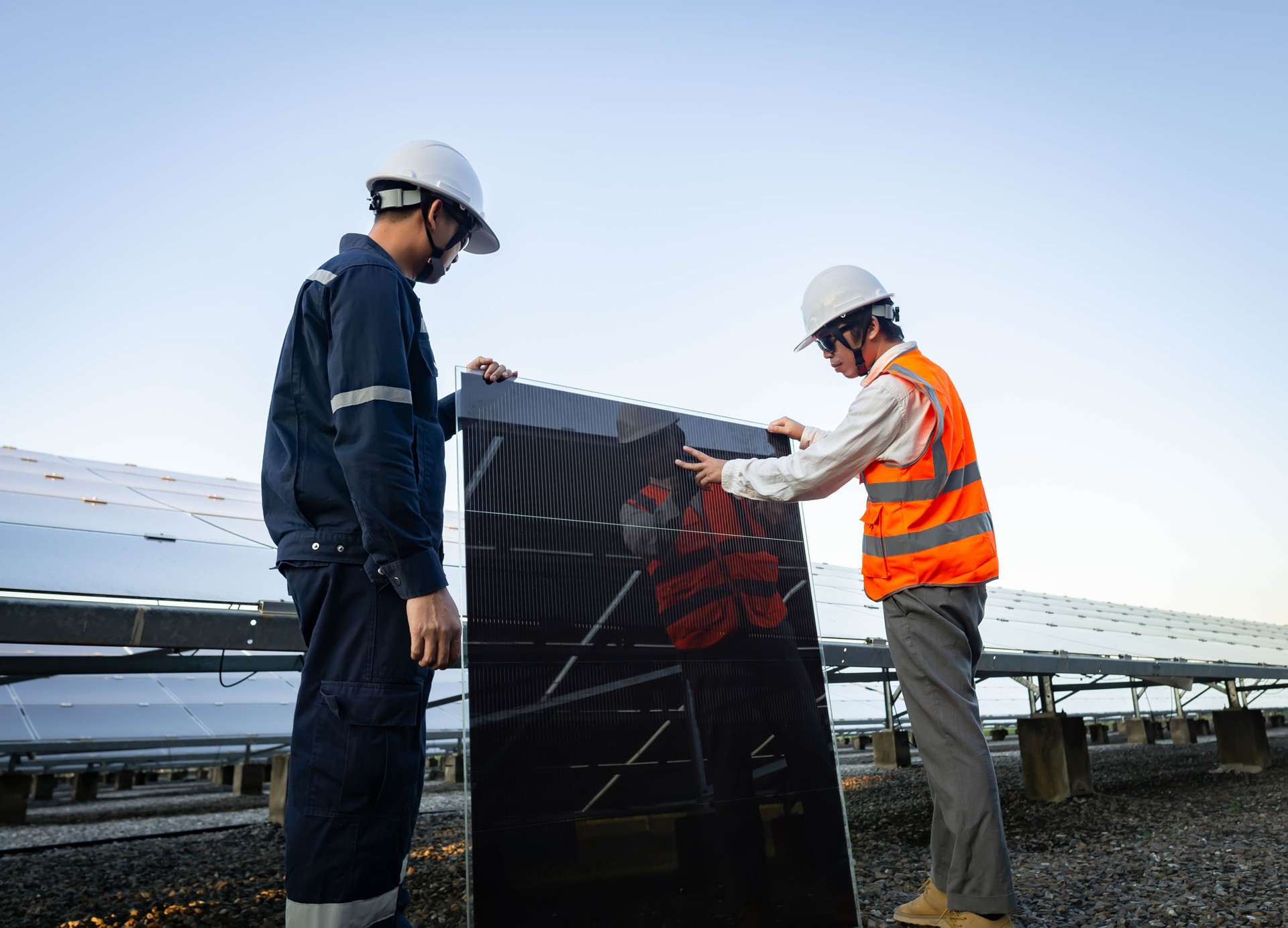 Technician is lifting the solar cell to replace the damaged one, Alternative energy to conserve the world's energy, Photovoltaic module idea for clean energy production