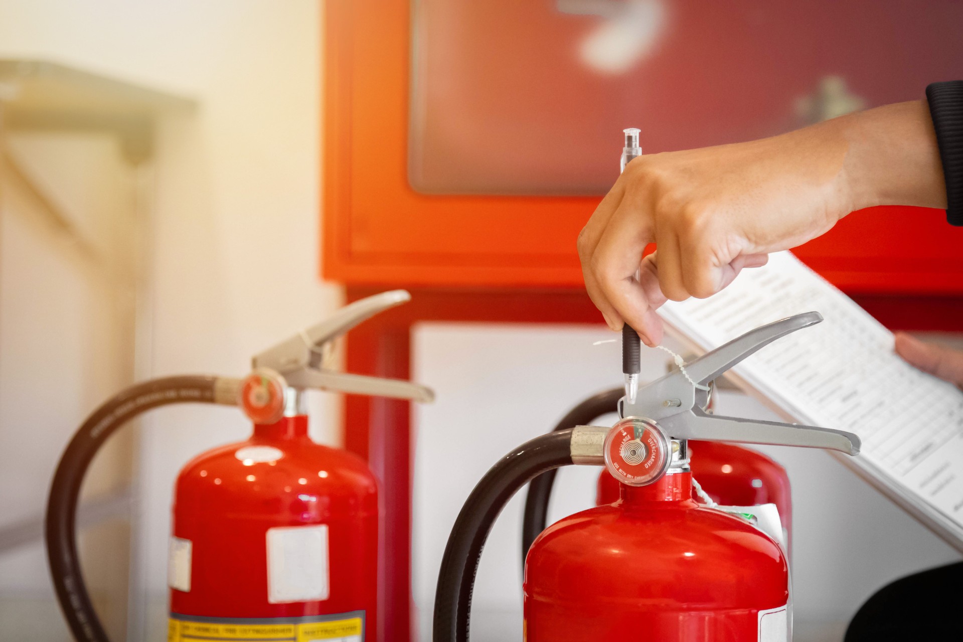 Engineer check fire suppression system,check fire extinguisher tank in the fire control room for safety